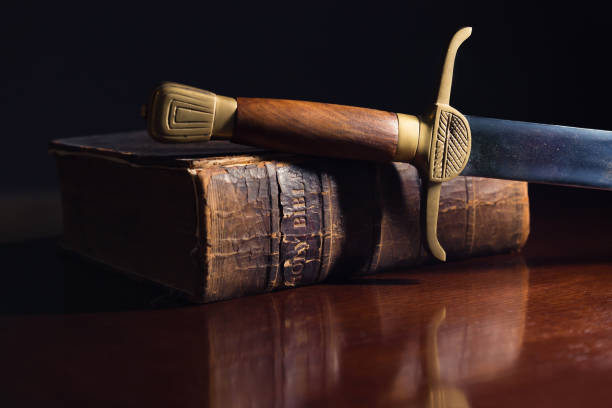 Ancient sword beside a 150 Year Old Bible